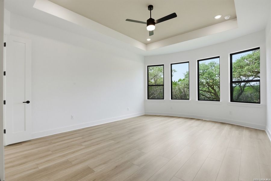 Spacious, unfurnished interior of a new home in Enchanted Bluff, San Antonio (Image 33).
