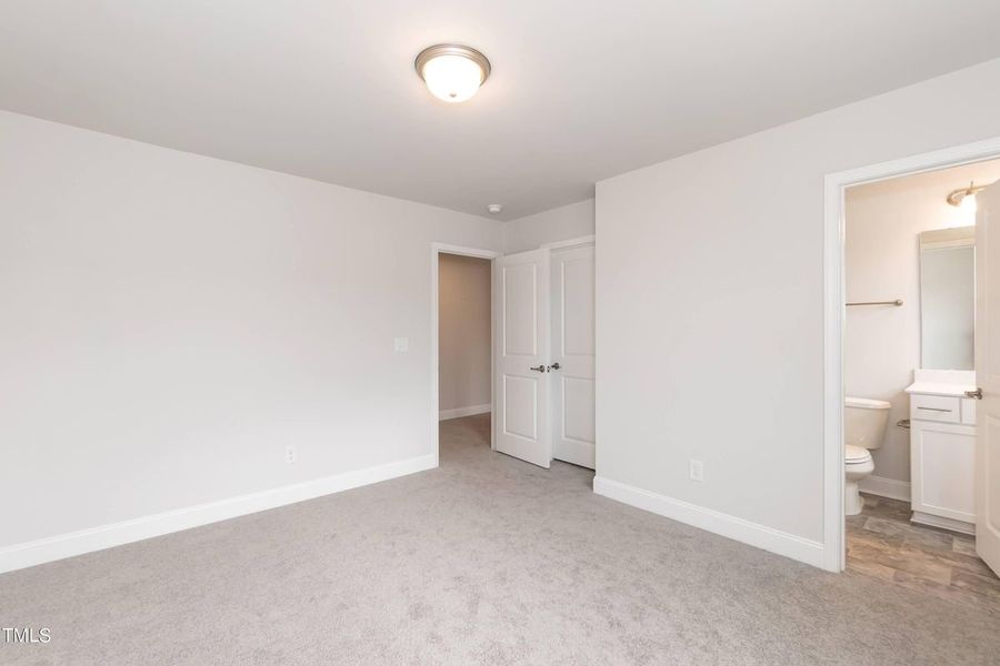 Representative unfurnished interior of a home built from the 2913 by Adams Homes in Hidden Pines, Cameron (Image 32).