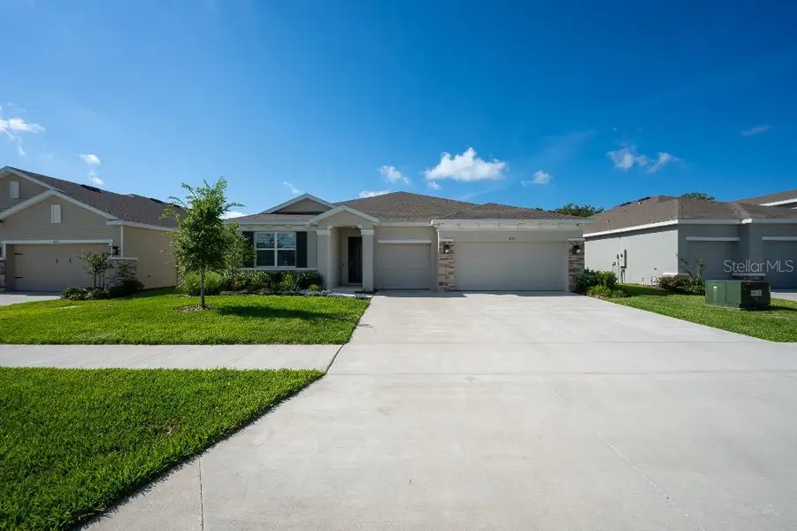 Front exterior of a new home in , Wildwood, FL, highlighting curb appeal (Image 2). Front exterior of a new home in , Wildwood, FL, highlighting curb appeal (Image 2).