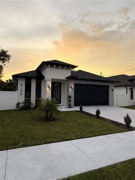 Front exterior of a new home in , Tampa, FL, highlighting curb appeal (Image 20).