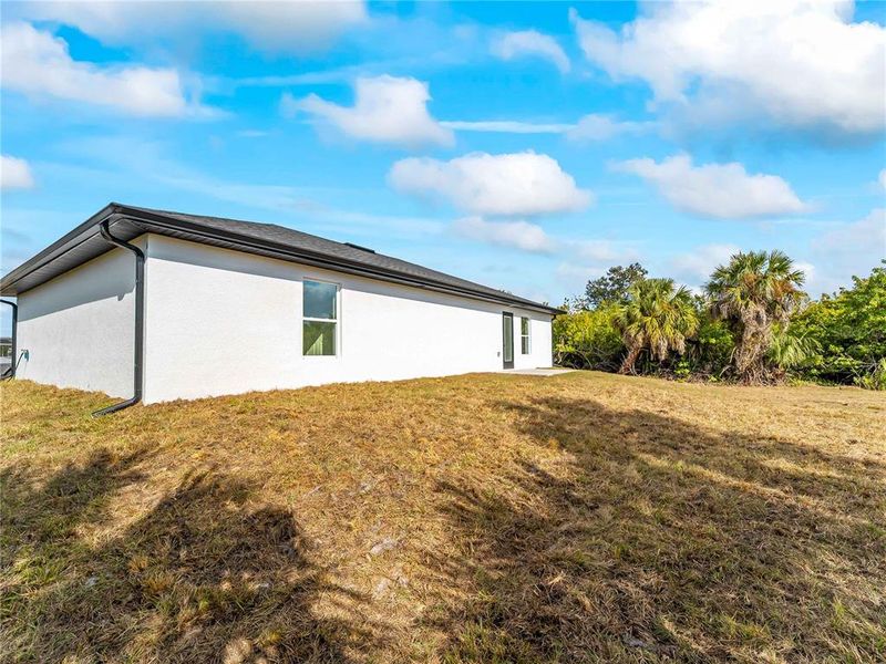 Exterior details and patio area of a home in , Port Charlotte (Image 39).