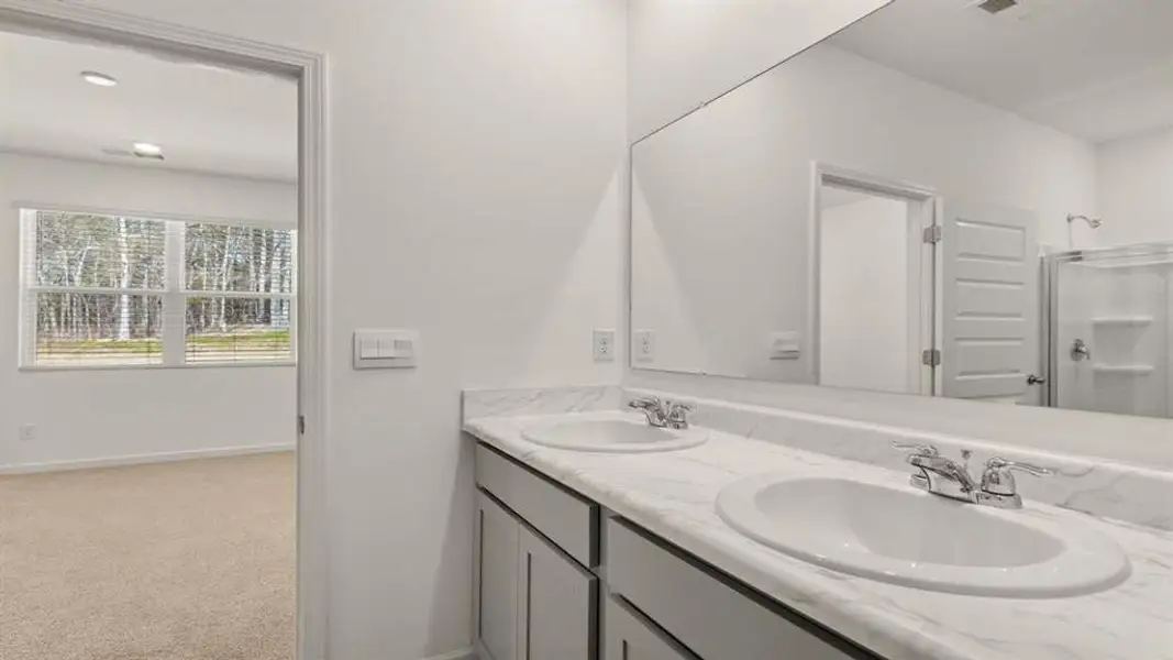 Furnished interior view inside a new home in Champion's Run, Lithonia (Image 12).