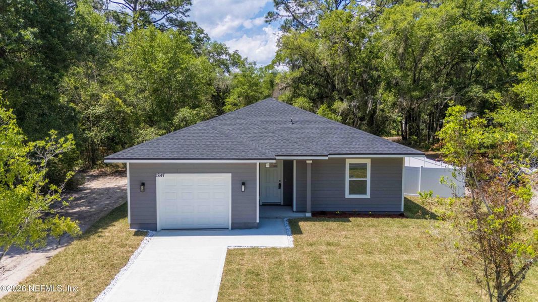 Front exterior of a new home in , Jacksonville, FL, highlighting curb appeal (Image 27).