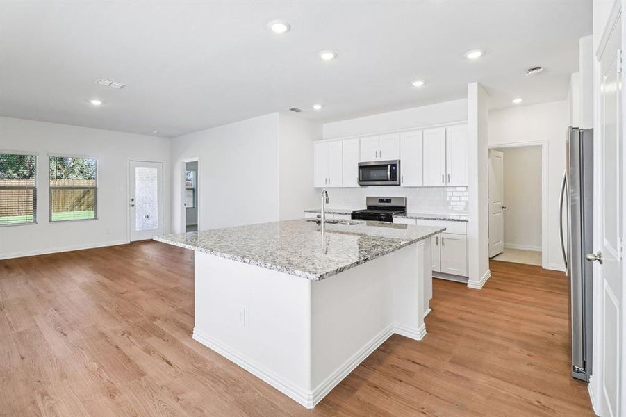 Furnished interior view inside a new home in Eastridge - Spring Series, McKinney (Image 7). Furnished interior view inside a new home in Eastridge - Spring Series, McKinney (Image 7).