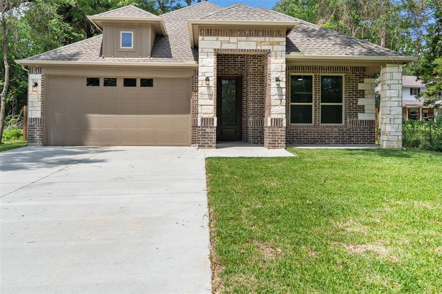 Front exterior of a new home in , Trinidad, TX, highlighting curb appeal (Image 22).