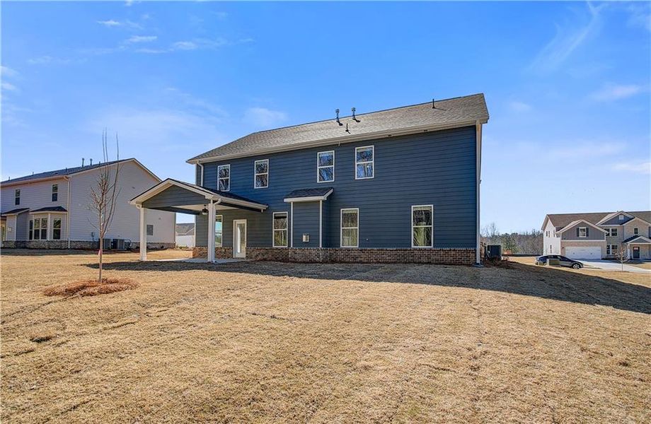 Exterior details and patio area of a home in Copperfield, Locust Grove (Image 4).