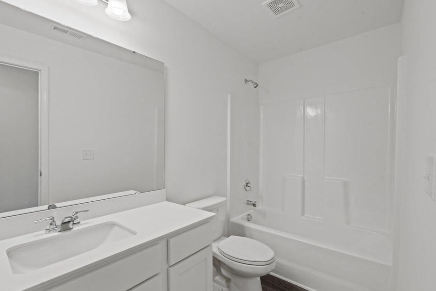 Furnished interior view inside a new home in The Trails at Carmel, Pflugerville (Image 8).