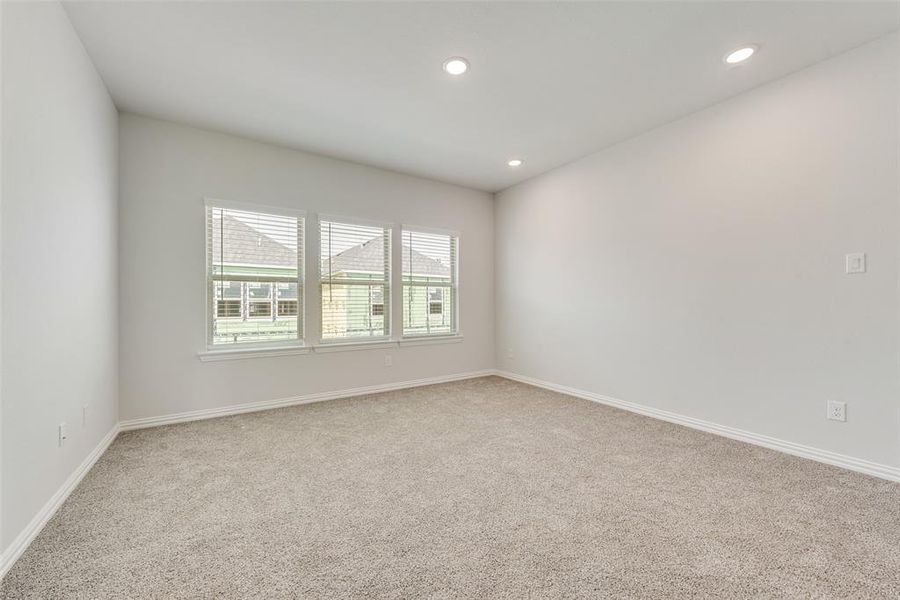 Unfurnished room with carpet flooring