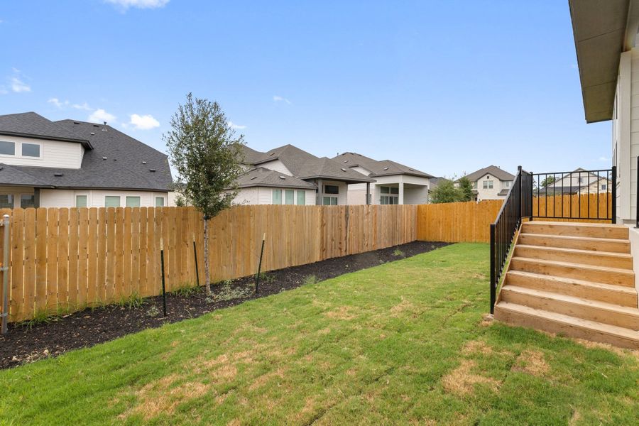 Exterior details and patio area of a home in Heritage, Dripping Springs (Image 31).