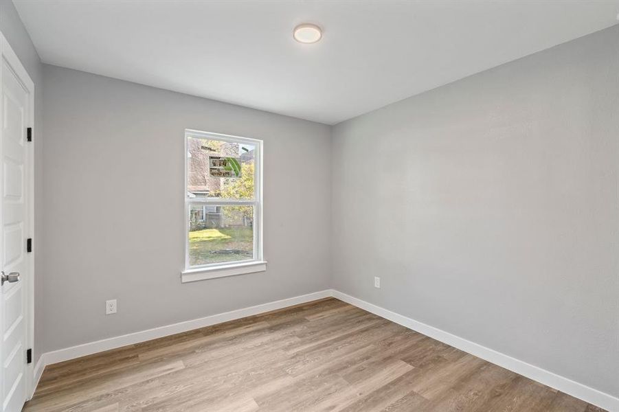 Unfurnished room featuring light hardwood / wood-style flooring