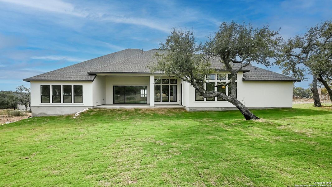 Exterior details and patio area of a home in The Preserve At Elm Creek 1 Acre, Canyon Lake (Image 4). Exterior details and patio area of a home in The Preserve At Elm Creek 1 Acre, Canyon Lake (Image 4).