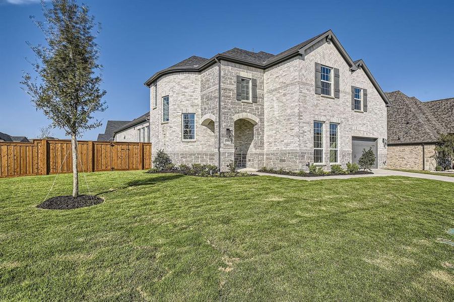 View of front of home with a front lawn