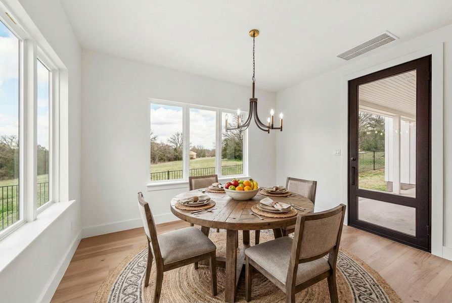 A nicely sized breakfast nook sits at the back of the home, overlooking the greenbelt and offering exceptional privacy. Step out onto the back porch afterward to enjoy your second cup of coffee.