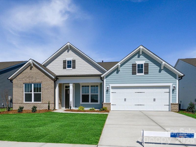 Front exterior of a new home in Encore at Harmony, Harrisburg, NC, highlighting curb appeal (Image 19).