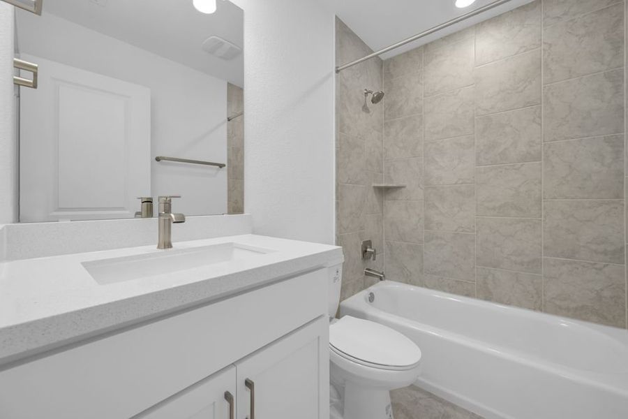 Furnished interior view inside a new home in Travisso Capri Collection, Leander (Image 7).