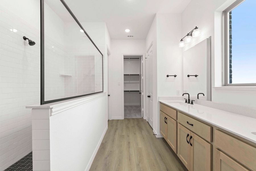 Primary Bathroom Representative Photo featuring the Artisan Collection Primary Bathroom Representative Photo featuring the Artisan Collection