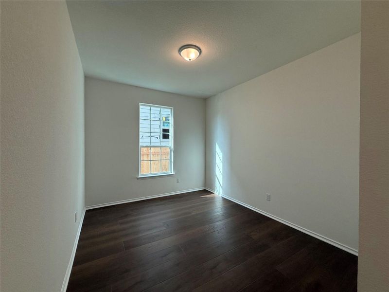 Spacious, unfurnished interior of a new home in River Bluff, Leander (Image 15).