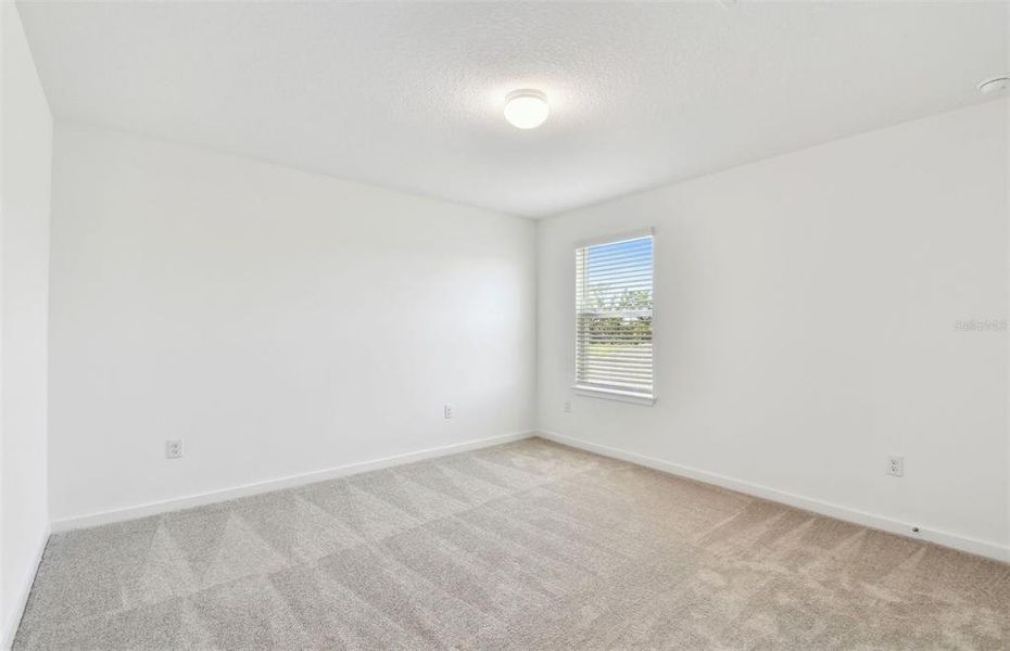 Spacious, unfurnished interior of a new home in Oakfield Lakes, Parrish (Image 14).