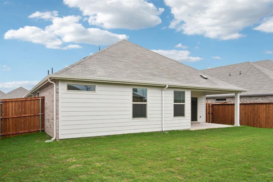 Exterior details and patio area of a home in Lakehaven - Signature Series, Farmersville (Image 4).