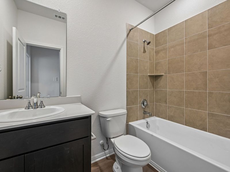 Furnished interior view inside a new home in Travena - Reserve Collection, Georgetown (Image 6).