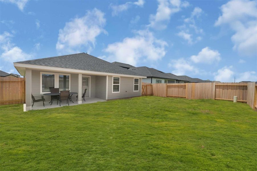 Exterior details and patio area of a home in Tamarron, Fulshear (Image 26).