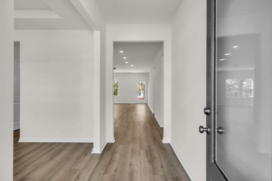 Entry foyer with the separate dining space to the left. Entry foyer with the separate dining space to the left.