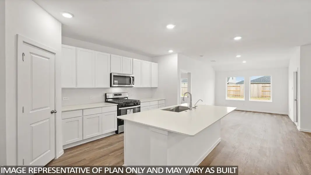 Furnished interior view inside a new home in Sunterra, Katy (Image 6).