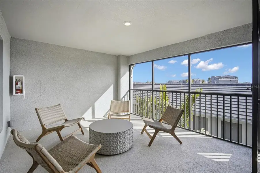 Exterior details and patio area of a home in Calusa Country Club, Lakewood Ranch (Image 3).
