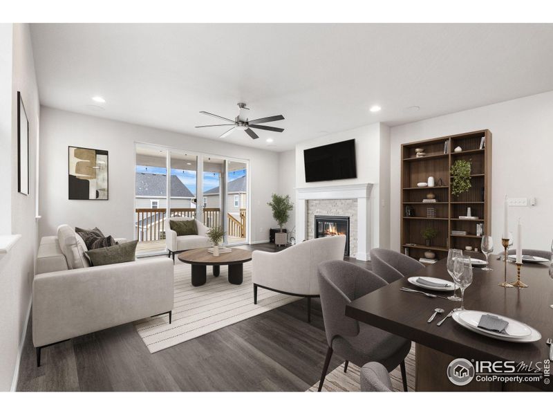 This photo has been virtually staged to provide visual ideas for how furniture can be arranged in this area of the home.