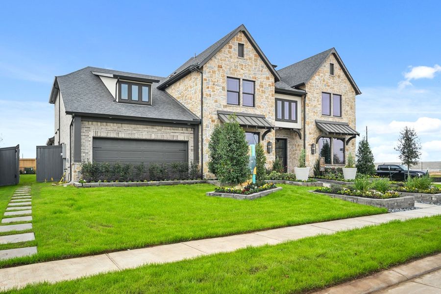 Front exterior of a new home in Jubilee 45', 50', 70', Hockley, TX, highlighting curb appeal (Image 26). Front exterior of a new home in Jubilee 45', 50', 70', Hockley, TX, highlighting curb appeal (Image 26).