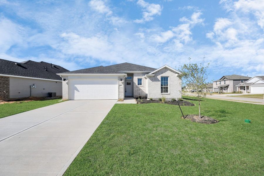Front exterior of a new home in Grand Oaks Reserve, Cleveland, TX, highlighting curb appeal (Image 25).