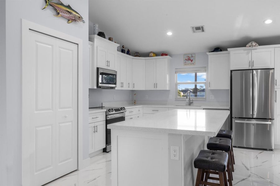 Furnished interior view inside a new home in , Port St. Lucie (Image 10).
