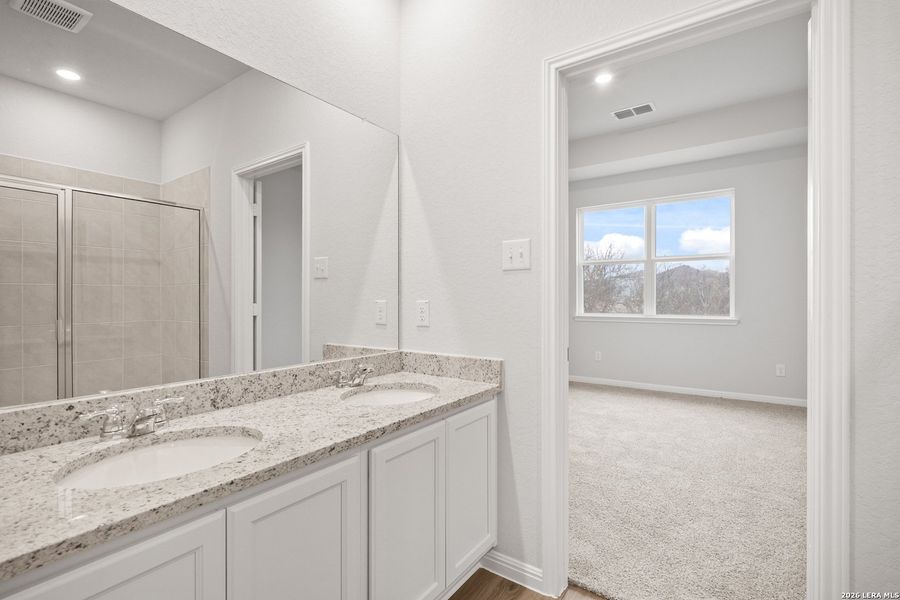 Furnished interior view inside a new home in Hunters Ranch, San Antonio (Image 10).