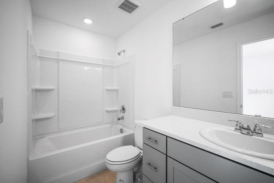 Furnished interior view inside a new home in The Townhomes at Skye Ranch, Sarasota (Image 13).