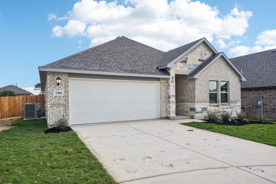 Front exterior of the Preston floorplan at a Meritage Homes community.