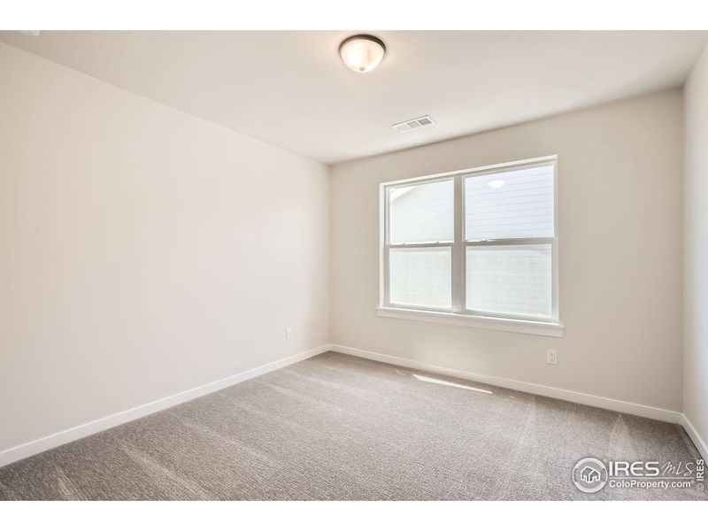 Spacious, unfurnished interior of a new home in RainDance National 60/70, Windsor (Image 25).