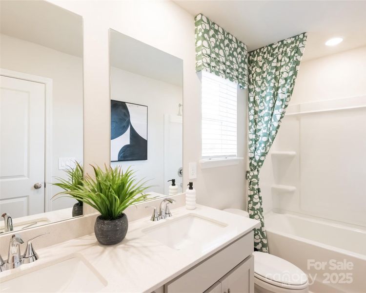 Photo is not of the actual home, but is an inspirational photo of builder’s model home and may depict options, furnishings, and/or decorator features that are not included