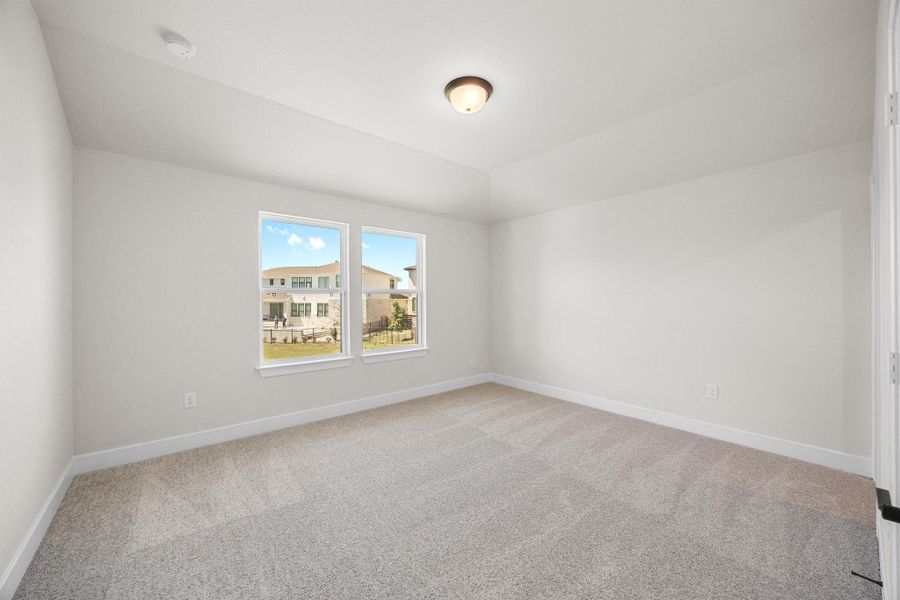 Spacious, unfurnished interior of a new home in Rough Hollow - Las Brisas, Austin (Image 18).
