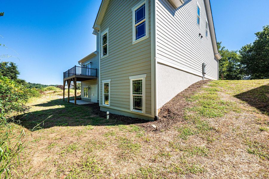 Front exterior of a new home in , Hickory, NC, highlighting curb appeal (Image 21).