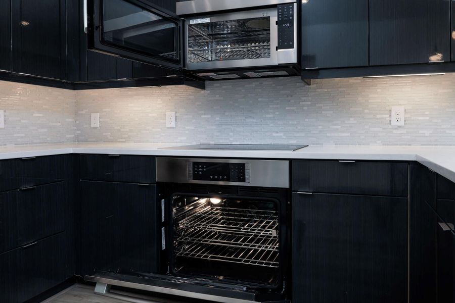 Convection microwave and oven plus induction cooktop