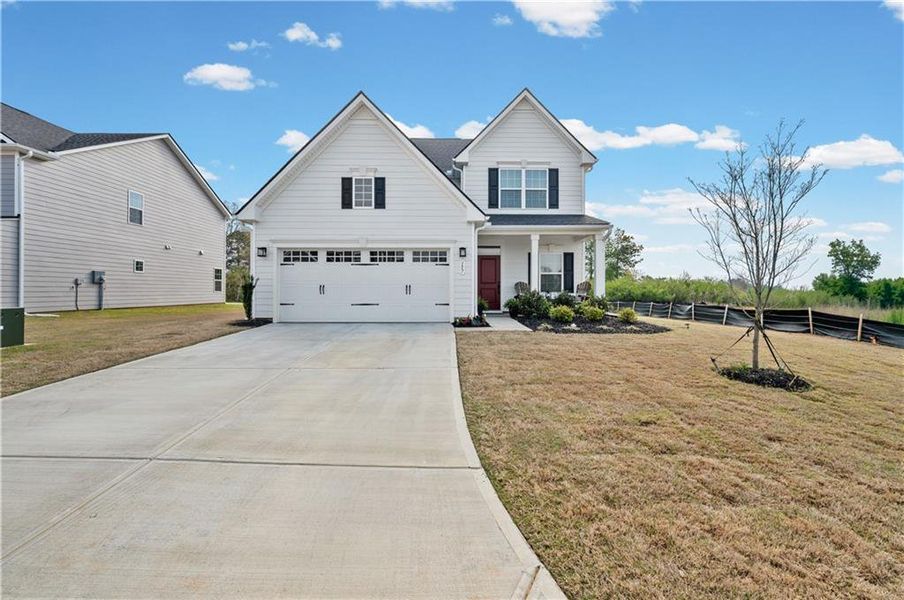 Front exterior of a new home in , Calhoun, GA, highlighting curb appeal (Image 26).