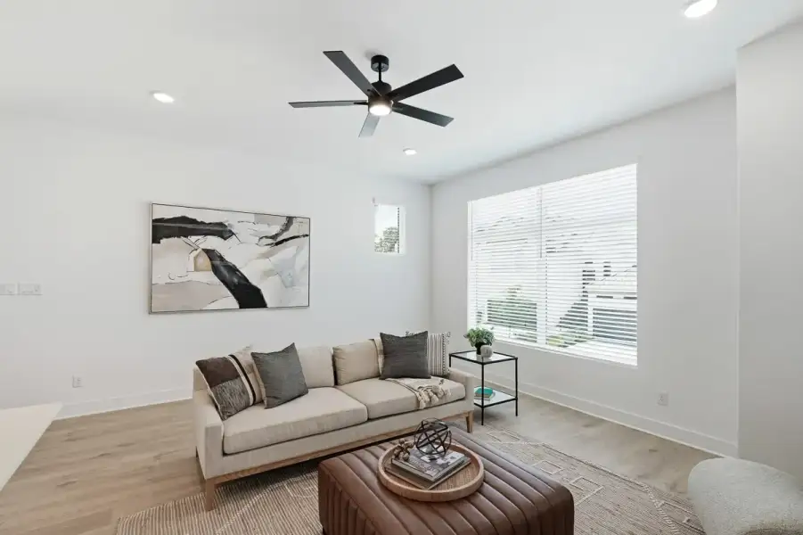 Representative furnished interior of a home built from the Calypso by Chesmar Homes in Centero at Stone Oak, San Antonio (Image 13).