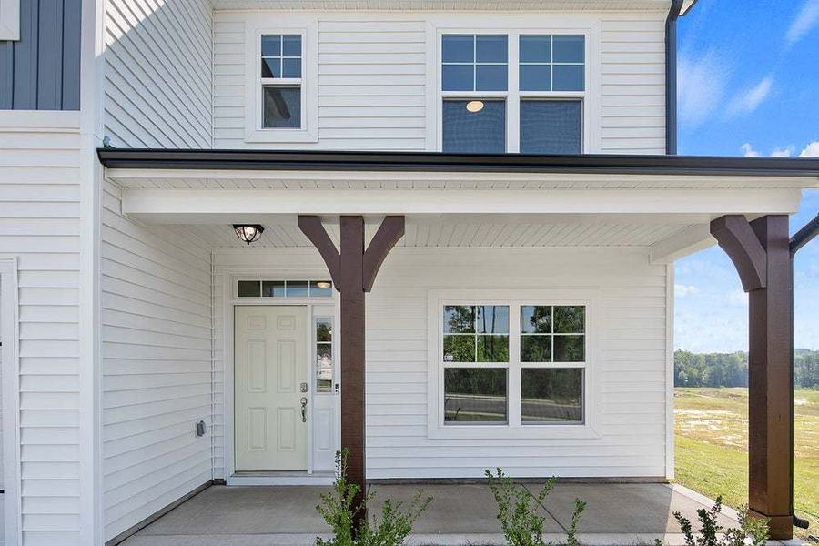 Representative exterior photo of a completed home built from the Pamlico by Caviness & Cates Communities in Bartlett Manor, Youngsville, NC (Image 16).