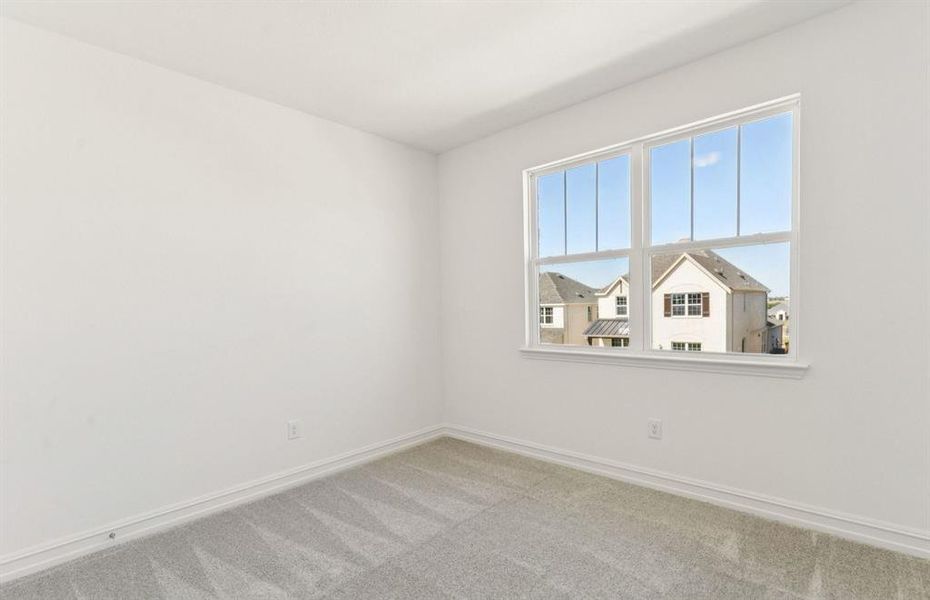 Inviting bedroom offering soft natural light Inviting bedroom offering soft natural light