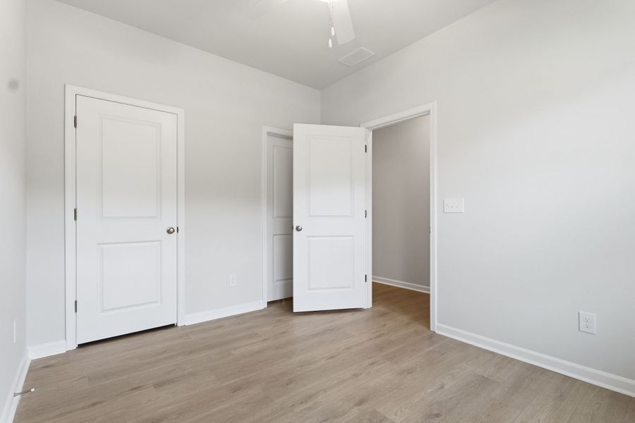 Spacious, unfurnished interior of a new home in Piper Creek, Newton (Image 17). Spacious, unfurnished interior of a new home in Piper Creek, Newton (Image 17).