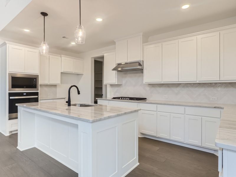 Plan 1542 Kitchen Representative Photo by American Legend Homes