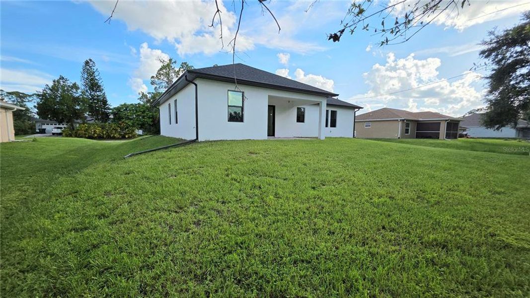 Front exterior of a new home in , North Port, FL, highlighting curb appeal (Image 1).