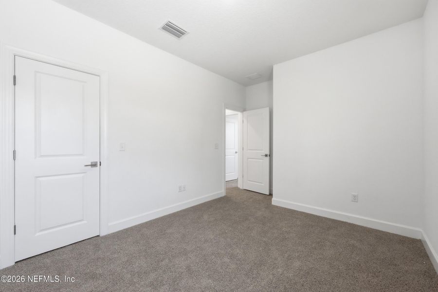 Spacious, unfurnished interior of a new home in Crosswinds 40’, Ponte Vedra (Image 36).