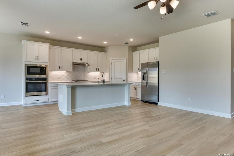 Furnished interior view inside a new home in Hennersby Hollow, San Antonio (Image 5).