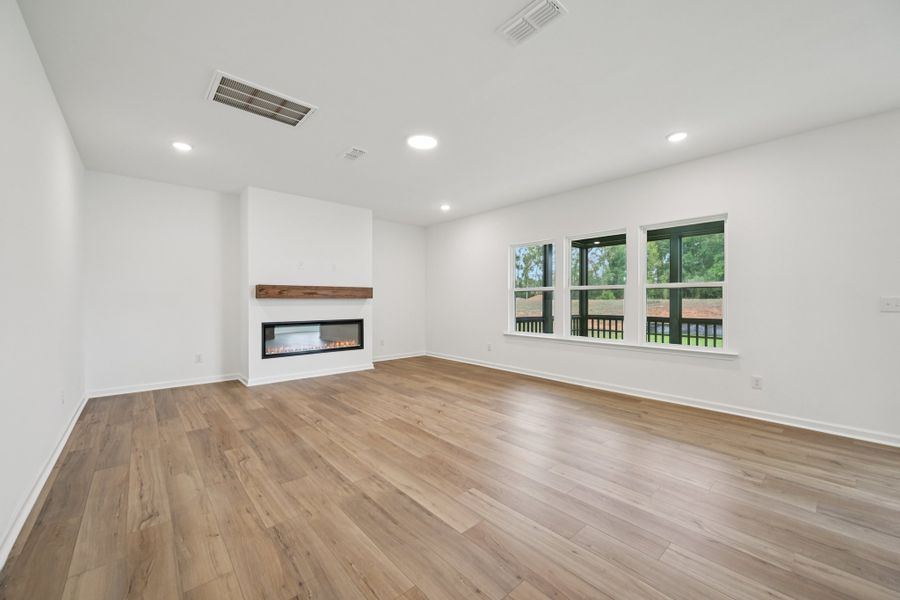 Representative unfurnished interior of a home built from the Macon by Ashton Woods in Rowland's Grant, Fuquay Varina (Image 38).